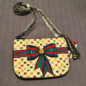 Crossbody canvas bag with leather tassel NWT Brighton.